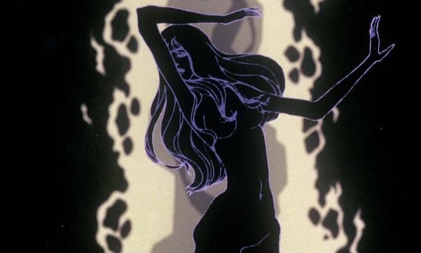 Woman dancing before a bright doorway